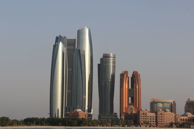 Low angle view of modern buildings against clear sky