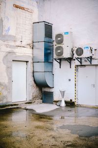 Air conditioners on exterior of building