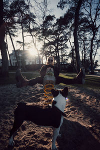 People sitting on street against sky