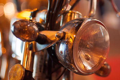 Close-up of motorcycle headlight