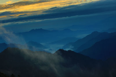 Scenic view of mountains against sky during sunset