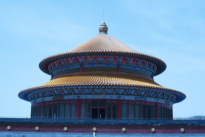 Low angle view of temple building against sky