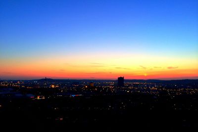 Illuminated cityscape at night