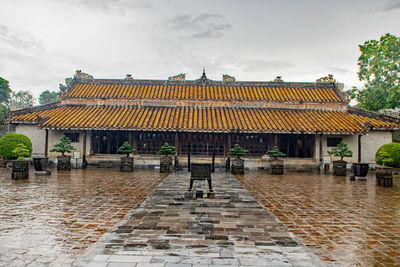 View of temple against building