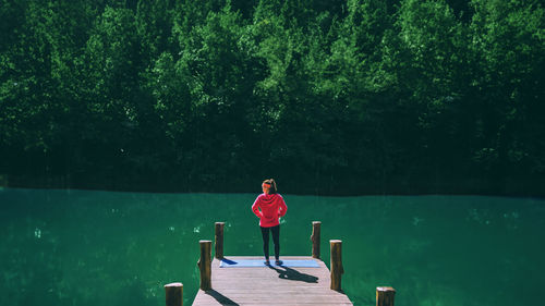 High angle view of man standing in sea