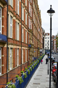 Man walking on street in city