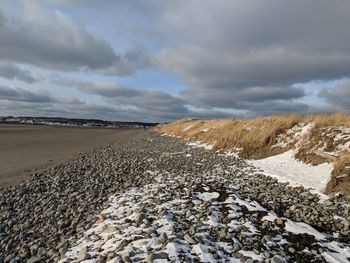 Scenic view of land against sky