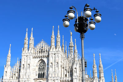 The skyline view of duomo, milan cathedral and street lights. milan, italy 