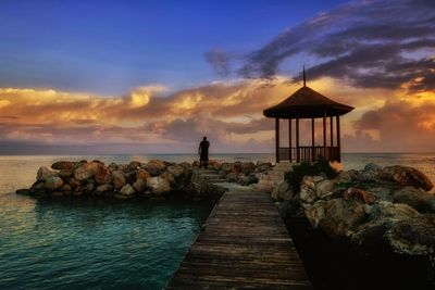 Scenic view of sea at sunset