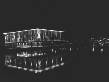 Reflection of illuminated buildings in water