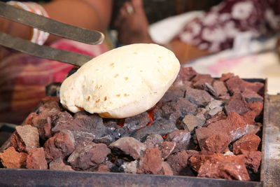 Close-up of person preparing food