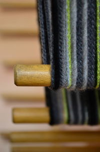 Close-up of rope tied on wood