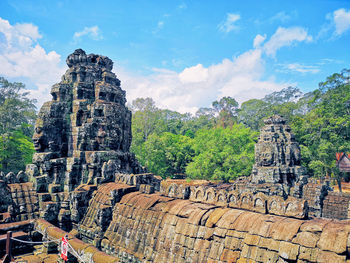 Old temple against cloudy sky