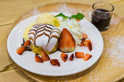 High angle view of dessert in plate on table