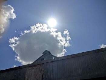 Building against cloudy sky