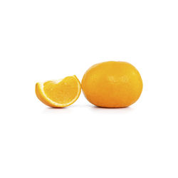 Close-up of orange against white background