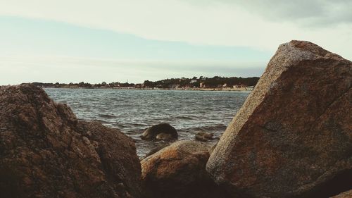 Scenic view of sea against cloudy sky