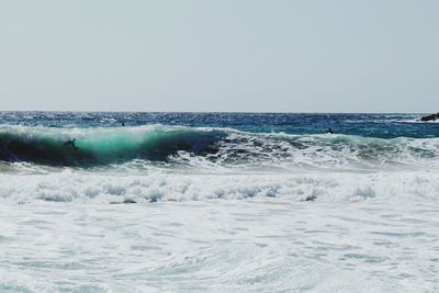 Scenic view of sea against clear sky