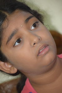 Close-up portrait of smiling girl