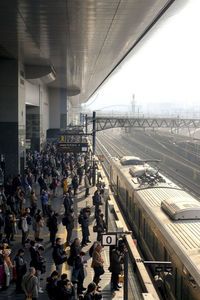 High angle view of people at railroad station