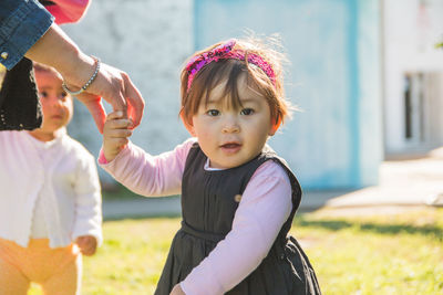 Portrait of cute little girl outdoors