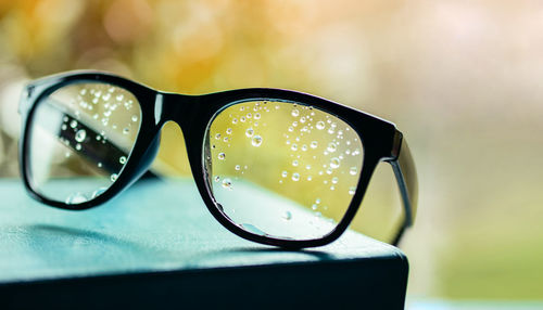 Close-up of sunglasses on table