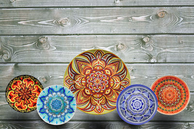 Directly above shot of multi colored umbrellas on table