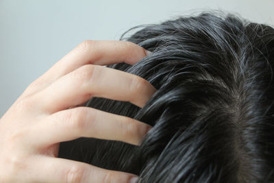 Cropped image of man with hair