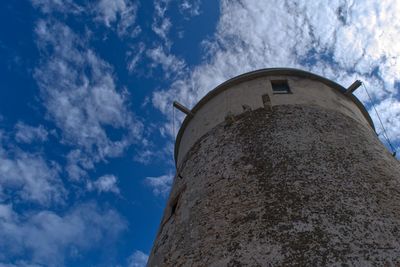 Low angle view of lighthouse against sky