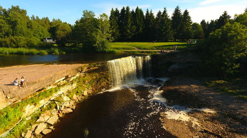 Scenic view of waterfall in park