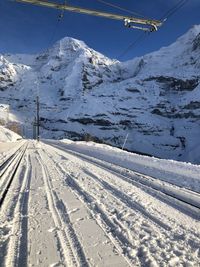 Scenic view of snow covered mountains