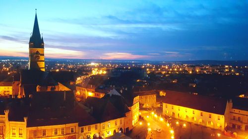 Illuminated cityscape at night