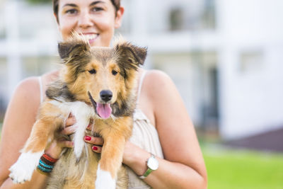 Portrait of woman with dog