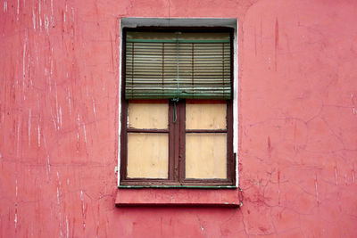 Closed window of old building