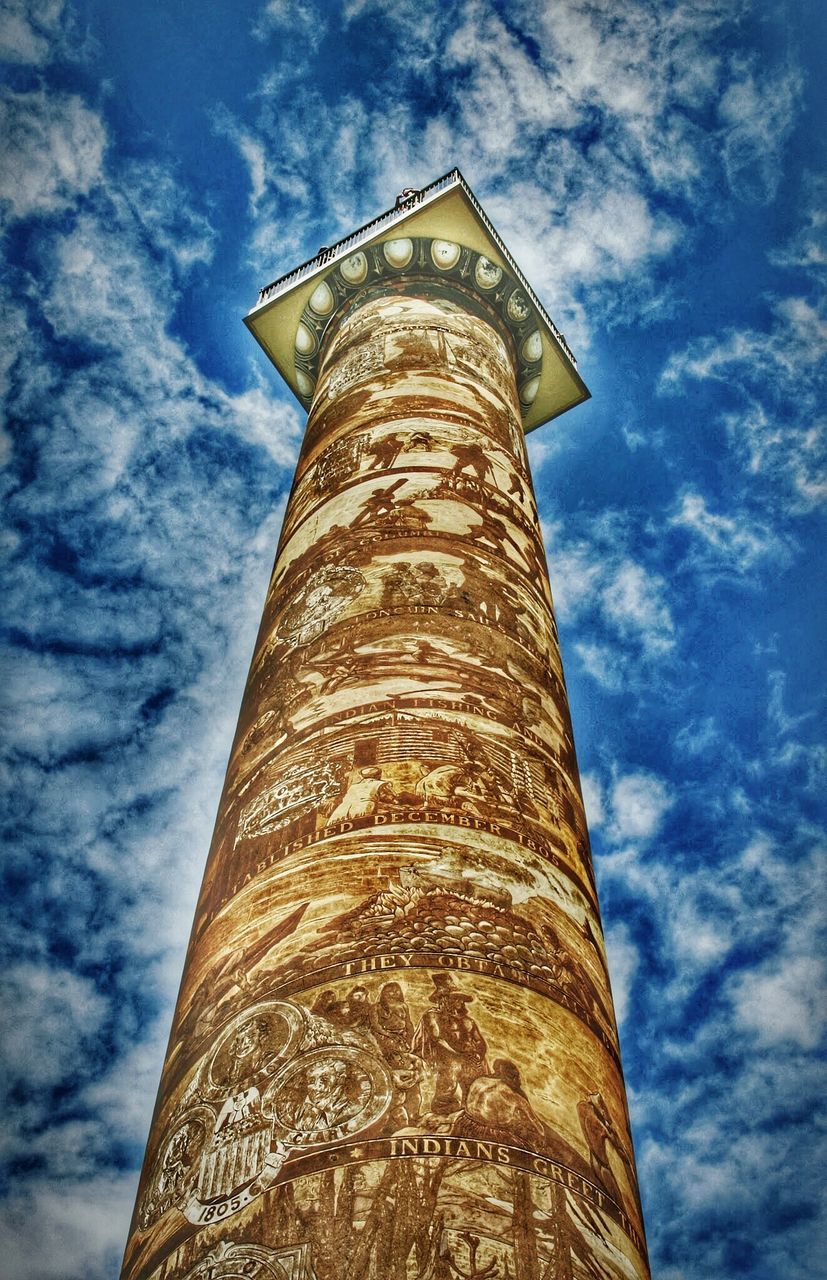 low angle view, sky, cloud - sky, architecture, tall - high, tower, built structure, nature, no people, day, building exterior, outdoors, blue, history, building, the past, architectural column, travel destinations, sunlight, travel, spire, skyscraper