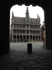 Group of people in front of historical building