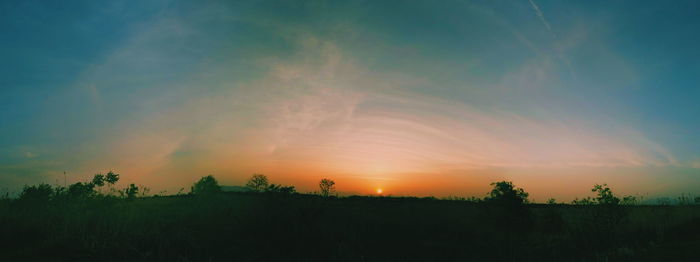 Scenic view of sunset over landscape