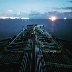 Panoramic view of illuminated bridge against sky