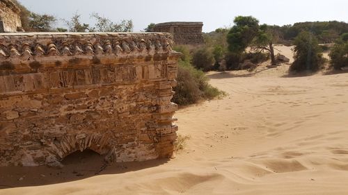 View of old ruin on beach