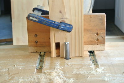 Work tool with wooden planks on router table at workshop