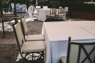 Empty chairs and table in restaurant