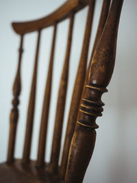 Spokes of back of simple antique wooden asian chair