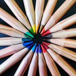 High angle view of multi colored pencils on table