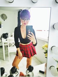 Young woman using smart phone