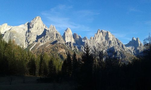 Idyllic shot of dolomites against sky