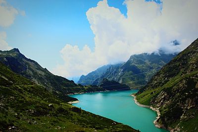 Panoramic view of lake and mountains against sky