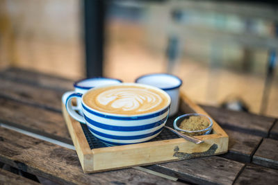 Coffee cup on table