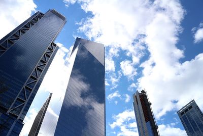 Low angle view of modern buildings against sky