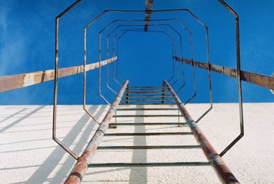 Staircase against blue sky