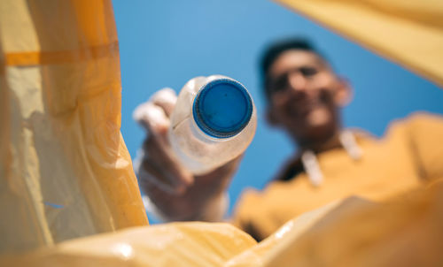 Close-up of man holding ice cream